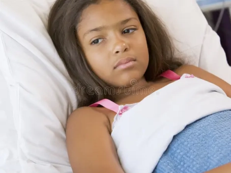 young-girl-lying-hospital-bed-6430183.jpg